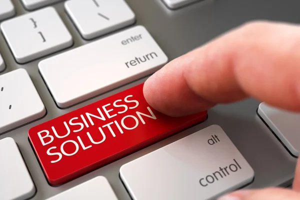 Palec ręki naciśnij Business Solution klawiatura. — Zdjęcie stockowe