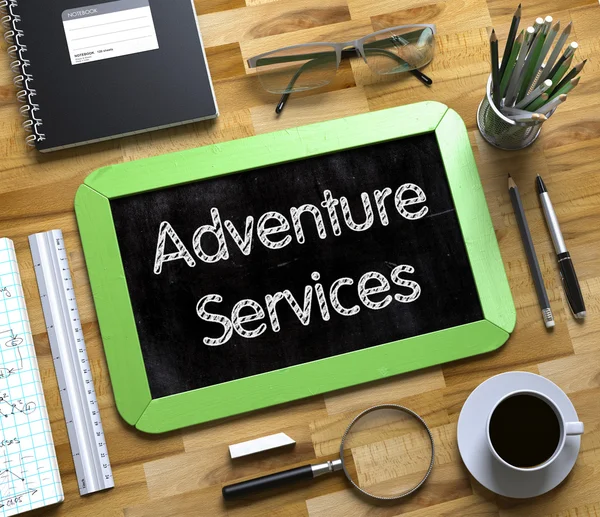 Small Chalkboard with Adventure Services Concept. — Stock Photo, Image