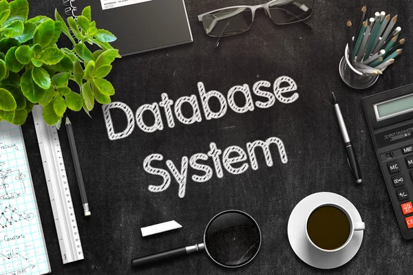 Databasesysteem - tekst op zwart schoolbord. 3D-rendering. — Stockfoto