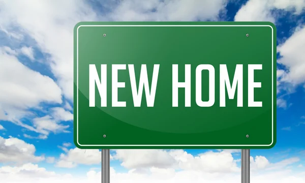 New Home on Green Highway Signpost. — Stock Photo, Image