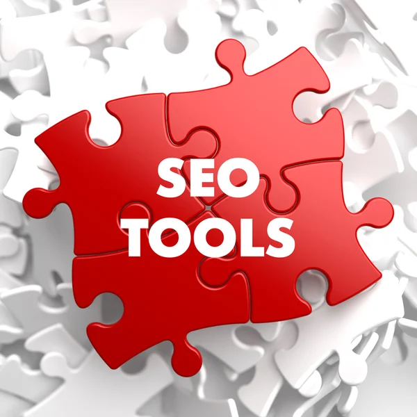 SEO Tools on Red Puzzle. — Stock Photo, Image