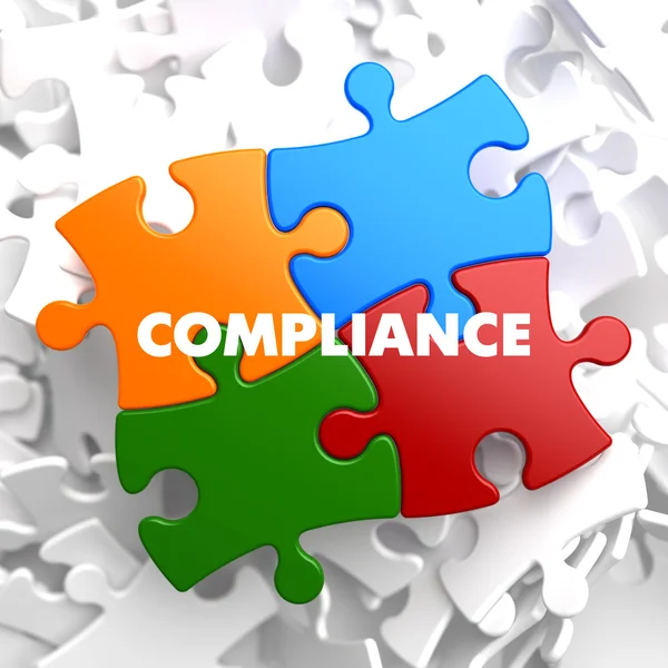 Compliance op multicolor puzzel. — Stockfoto