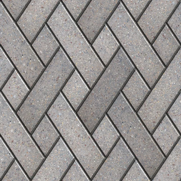 Dekoratives Musterfragment aus grauen Pflasterplatten. — Stockfoto