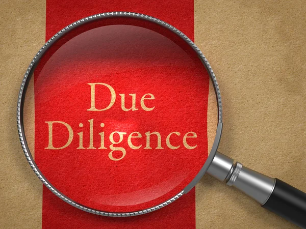 Due Diligence through Magnifying Glass. — Stock Photo, Image