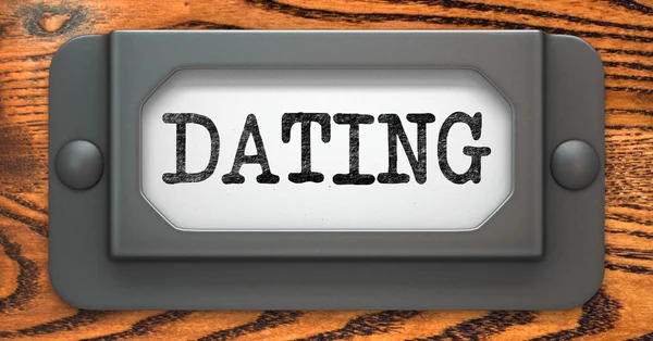 Dating - concept op label houder. — Stockfoto