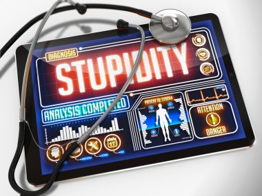 Stupidity on the Display of Medical Tablet. clipart