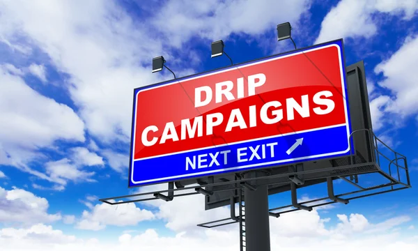 Drip Campaigns on Red Billboard. — Stock Photo, Image
