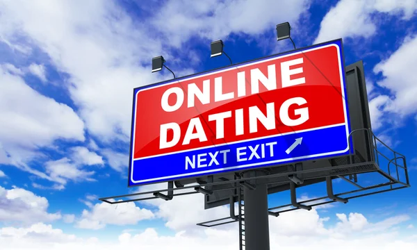 Online Dating inscriptie op rode Billboard. — Stockfoto