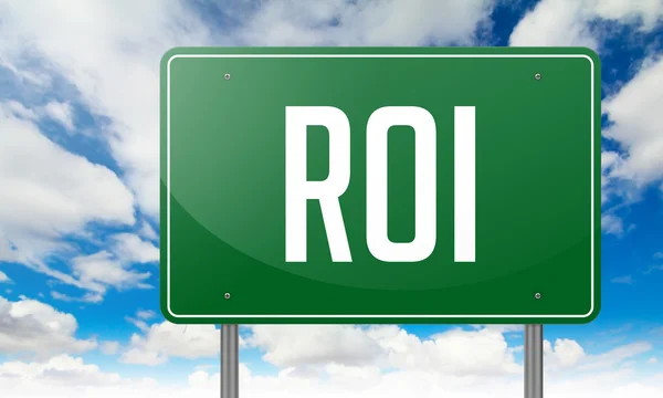 ROI op Highway Signpost. — Stockfoto