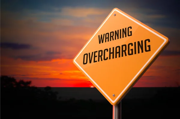 Overcharging on Warning Road Sign. — Stock Photo, Image