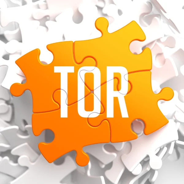 Tor op Oranje puzzel. — Stockfoto