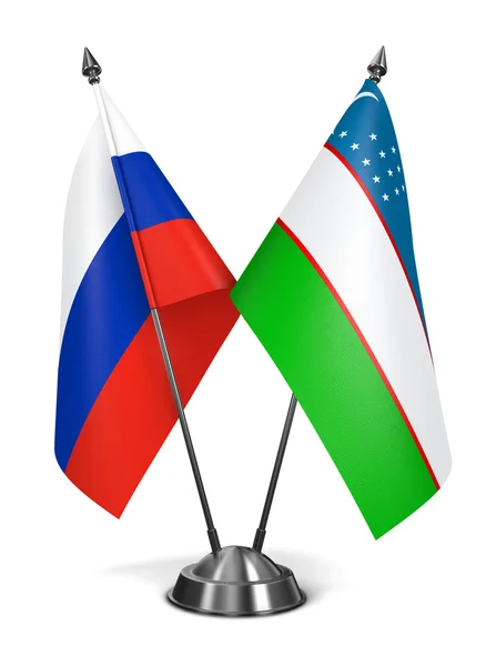 Russia and Uzbekistan - Miniature Flags. — Stock Photo, Image
