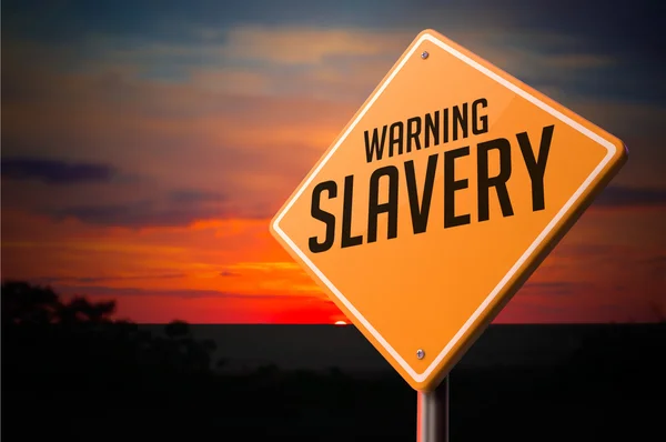 Slavery on Warning Road Sign. — Stock Photo, Image