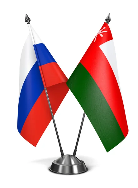 Russia and Oman - Miniature Flags. — Stock Photo, Image