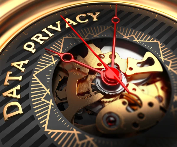 Privacy van gegevens op zwart-gouden horloge gezicht. — Stockfoto