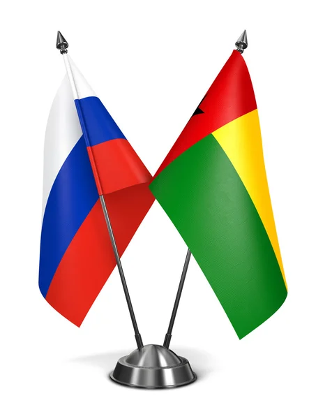 Rusko a Guinea-Bissau o miniaturní příznaky. — Stock fotografie
