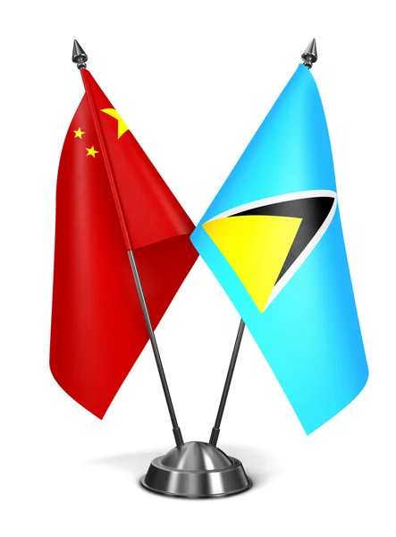 Chiny i Saint Lucia - miniaturowe flagi. — Zdjęcie stockowe