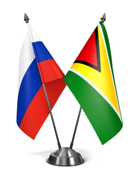 Russland und Guyana - Miniaturfahnen. — Stockfoto