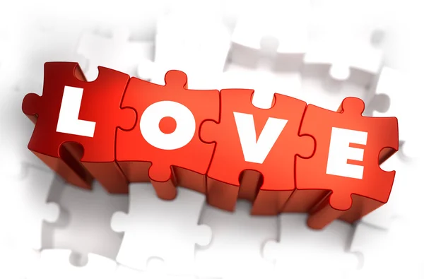 Love - Text on Red Puzzles with White Background. — Stock Photo, Image