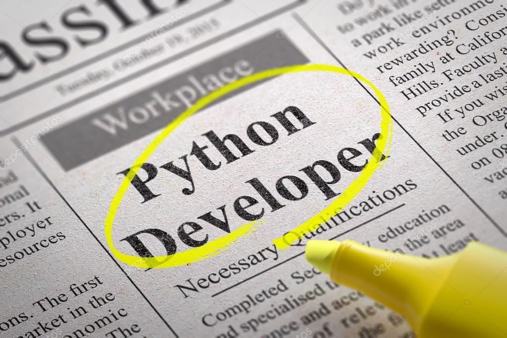 Python Developer Vacancy in Newspaper. Stock Photo by ©tashatuvango