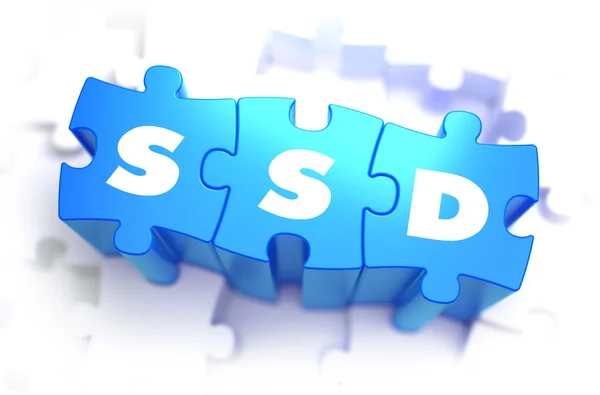 SSD - Palabra blanca en rompecabezas azules . — Foto de Stock