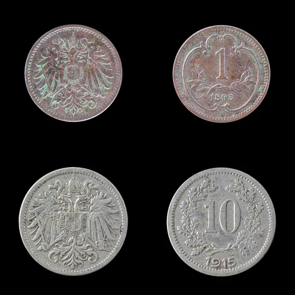 Duas moedas europeias em fundo negro . — Fotografia de Stock