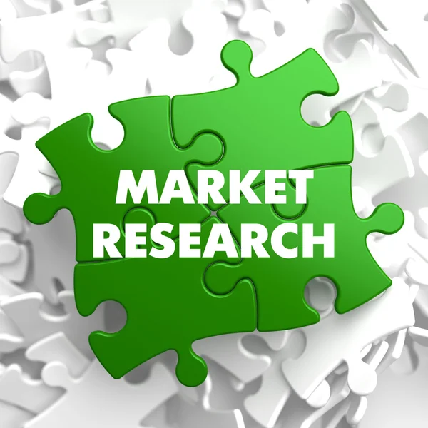 Market Research on Green Puzzle. — Stock Photo, Image