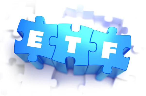 ETF - Palabra blanca sobre rompecabezas azules . —  Fotos de Stock