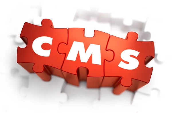 CMS - wit Word op rode puzzels. — Stockfoto