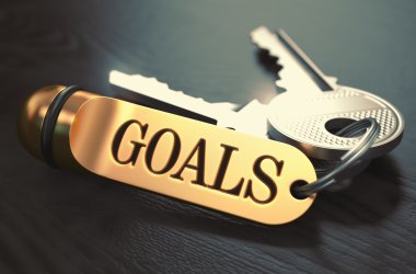 Goals - Bunch of Keys with Text on Golden Keychain. clipart