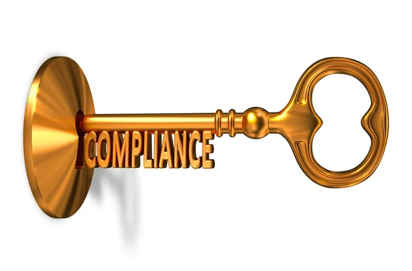 Compliance - Golden Key is Inserted into the Keyhole. — Stock Photo, Image