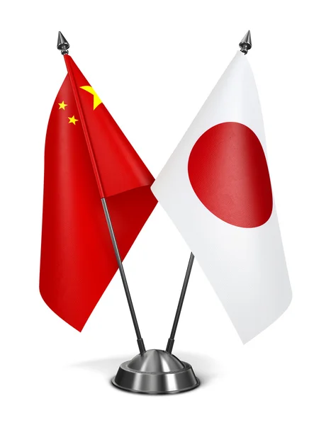 China en Japan - miniatuur vlaggen. — Stockfoto