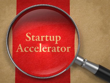 Startup Accelerator through Magnifying Glass. clipart