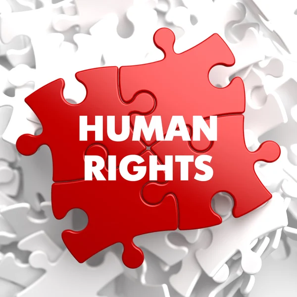 Human Rights on Red Puzzle. — Stock Photo, Image