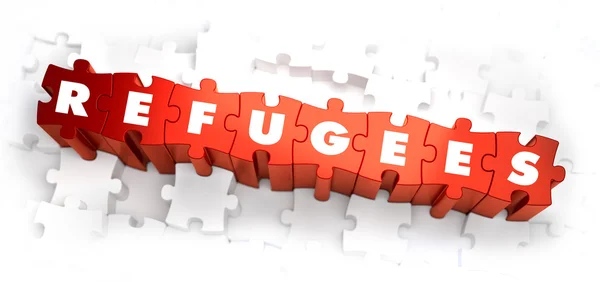 Refugiados - Palavra branca sobre quebra-cabeças vermelhos . — Fotografia de Stock