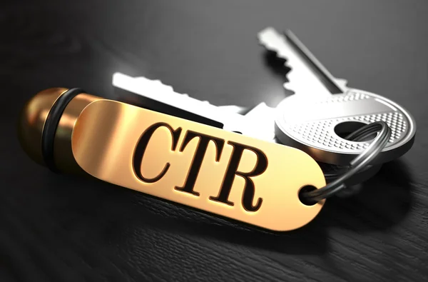 Sleutels met Word Ctr op gouden etiket. — Stockfoto