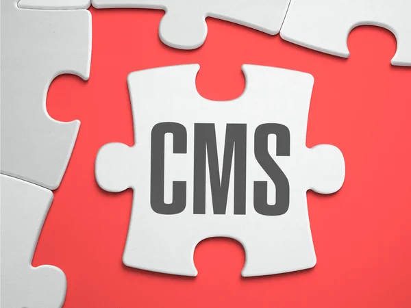CMS - puzzle a hiányzó darabokat helye. — Stock Fotó