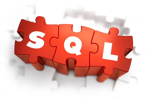 SQL - Text on Red Puzzles. — Stock Photo, Image