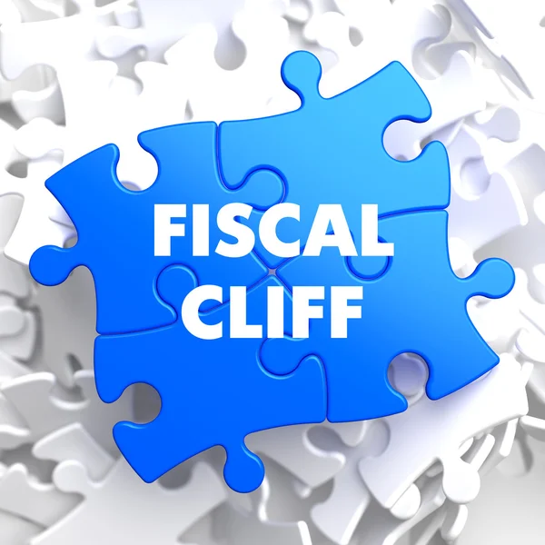 Fiscal Cliff on Blue Puzzle. — Stock fotografie