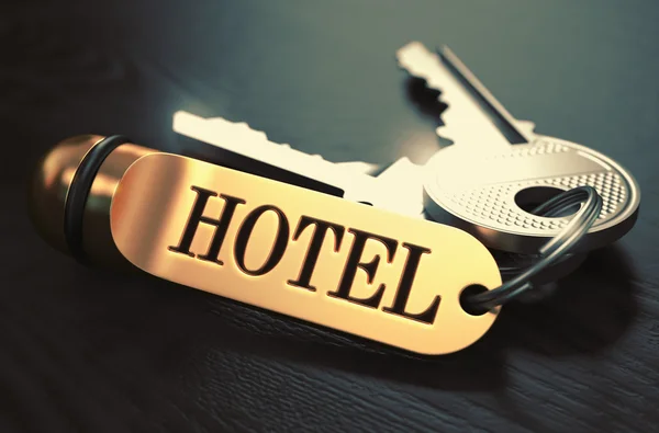Hotel - Bunch of Keys with Text on Golden Keychain. — Stock Photo, Image