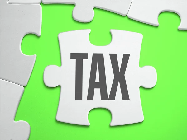 Tax - Jigsaw Puzzle with Missing Pieces. — Stockfoto