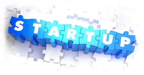 Startup - weißes Wort auf blauen Puzzles. — Stockfoto