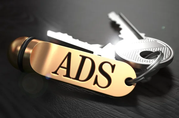 Keys with Word Ads on Golden Label. — Stockfoto
