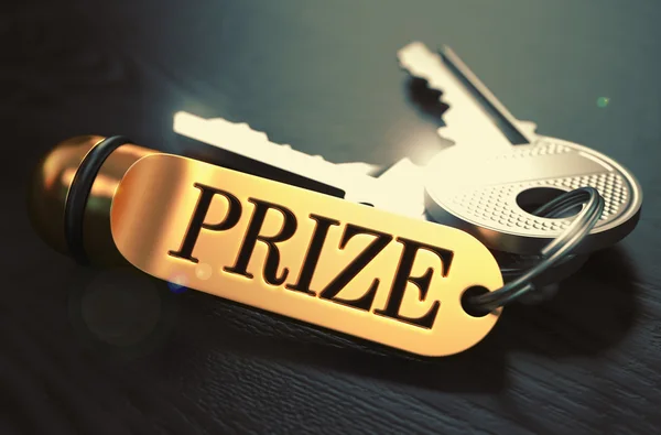 Premio - mazzo di chiavi con testo sul portachiavi d'oro . — Foto Stock