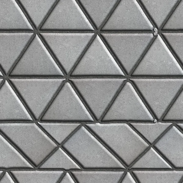 Lajes de pavimentação cinza na forma de triângulos e outras formas geométricas . — Fotografia de Stock