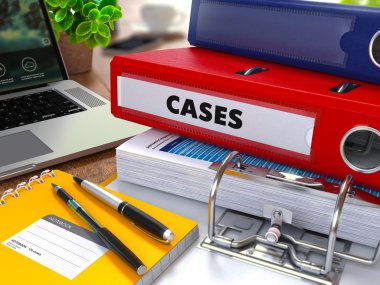 Red Ring Binder with Inscription Cases.