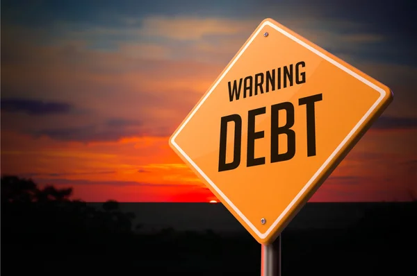 Debt on Warning Road Sign. — Stockfoto