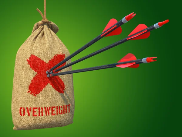 Overweight - Arrows Hit in Red Target. — стокове фото