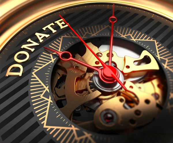 Donate on Black-Golden Watch Face. — Stockfoto