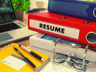 Red Office Folder with Inscription Resume.